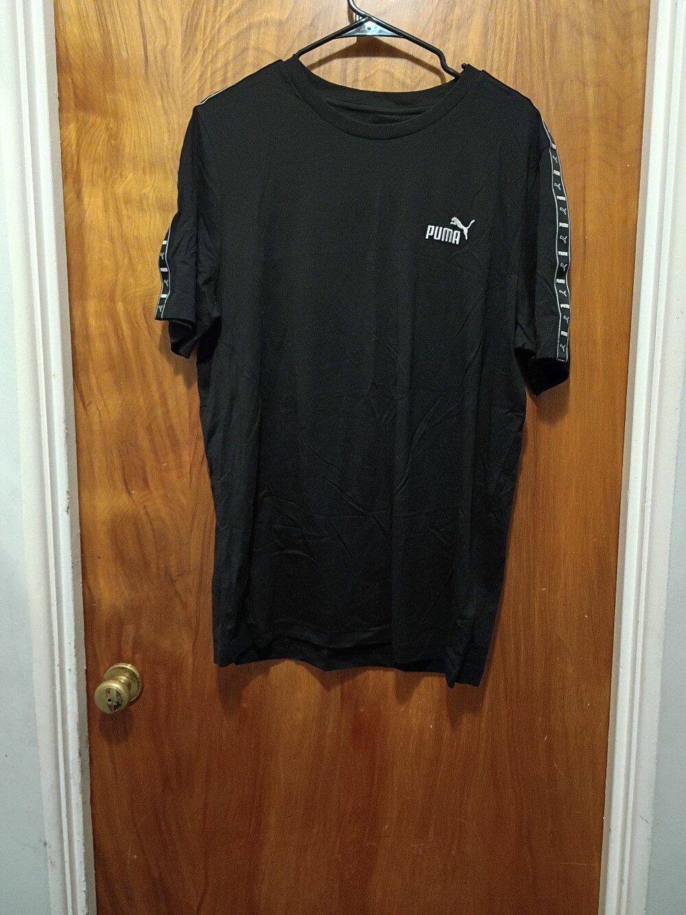 Puma Black Short-Sleeve Tee with Logo Tape on Sleeves